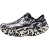 Mizuno Wave Rebellion Pro...
