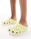 Crocs Classic clogs in yellow...